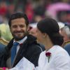 La famille royale de Suède s'est rassemblée le 14 juillet 2014 pour le traditionnel gala organisé à Borgholm, sur l'île d'Öland, pour l'anniversaire de la princesse Victoria, qui a eu 37 ans. La pluie s'est invitée, ce qui n'a pas contrarié la bonne humeur du prince Daniel, de la princesse Madeleine de Suède et Chris O'Neill ou encore du prince Carl Philip et Sofia Hellqvist...