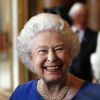 La reine Elizabeth II lors de la réception en l'honneur des lauréats des Queen's Leaders Awards le 14 juillet 2014 à Buckingham Palace.