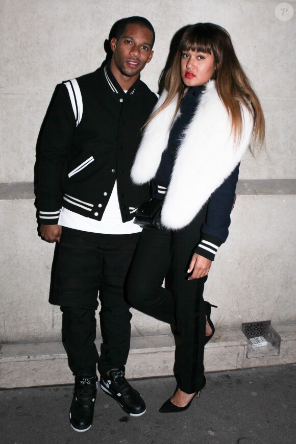 Victor Cruz et Elaina Watley à la sortie de l'after-show du défilé Givenchy au Club No Comment de Paris, le 17 janvier 2014