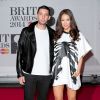 Example (Elliot John Gleave) et sa femme Erin McNaught lors des Brit Awards à Londres le 19 février 2014