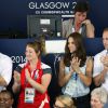 Le prince Harry, Kate Middleton et le prince William au Tolcross Swimming Centre de Glasgow le 28 juillet 2014 pour les épreuves de natation des XXe Jeux du Commonwealth.