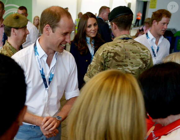 Le prince William, Kate Middleton et le prince Harry le 28 juillet 2014 aux XXe Jeux du Commonwealth, à Glasgow.
