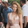 Kylie Minogue quitte l'hôtel Martinez pour se rendre à la soirée de l'AmfAR lors du 67ème festival international du film de Cannes. Le 22 mai 2014.