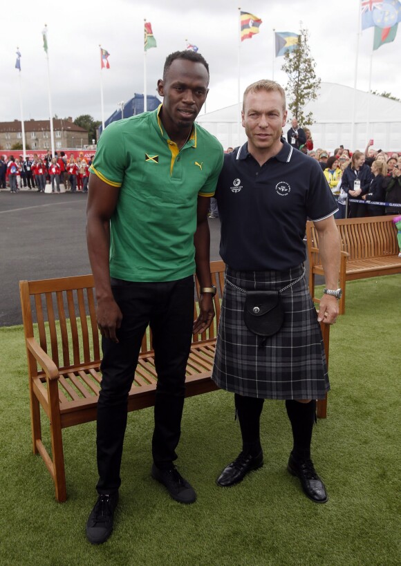 Usain Bolt et Sir Chris Hoy dans le village des XXe Jeux du Commonwealth à Glasgow, le 29 juillet 2014.