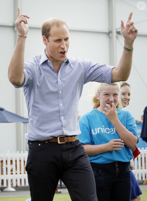 Le prince William participe à des activités au village des XXe Jeux du Commonwealth à Glasgow, le 29 juillet 2014.