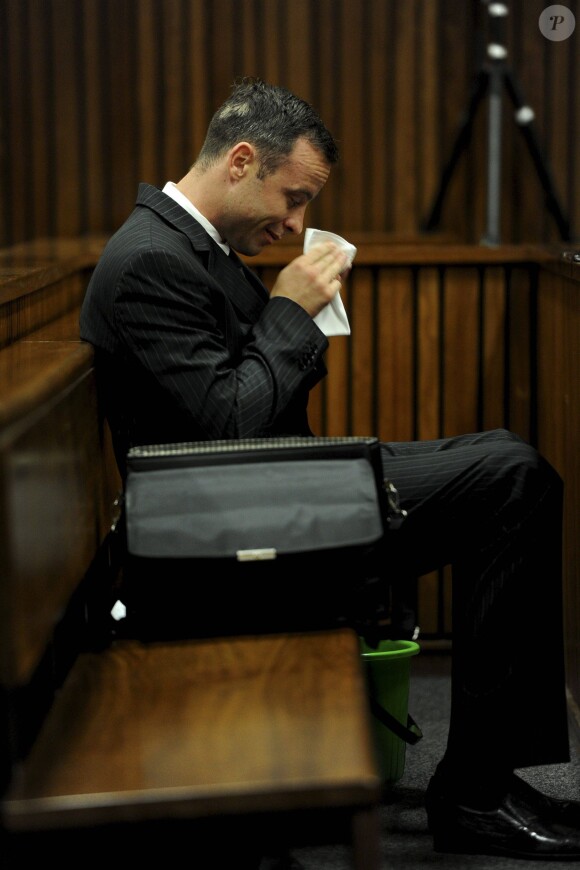 Oscar Pistorius lors de sn procès pour le meurtre de Reeva Steenkamp à la haute cour de justice de Pretoria, le 18 mars 2014