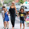 Heidi Klum et ses enfants Leni, Henry, Johan et Lou se promènent dans le quartier de Soho à New York, le 18 juillet 2014.