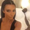 Kim Kardashian et Kanye West, dans leur chambre d'hôtel à l'issue de l'anniversaire de Riccardo Tisci. Ibiza, le 1er août 2014.