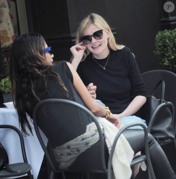 Kirsten Dunst avec une amie à Londres le 11 juin 2014.