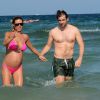 Michelle Hunziker (enceinte) et son compagnon Tomaso Trussardi, rejoint par sa fille Aurora Ramazzotti, passent leurs vacances a Ibiza. Le 19 juillet 2013 