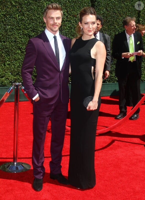 Derek Hough et Amy Purdy arrivent au Nokia Theater pour assister à la cérémonie des Creative Arts Emmy Awards 2014. Los Angeles, le 16 août 2014.