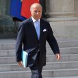Laurent Fabius, ministre des Affaires étrangères et du Développement international - Paris, le 20 août 2014 - Sortie du conseil des ministres au Palais de l'Elysée à Paris.
