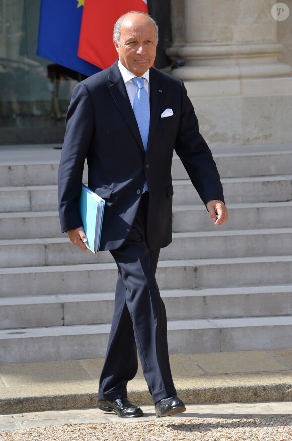 Laurent Fabius, ministre des Affaires étrangères et du Développement international - Paris, le 20 août 2014 - Sortie du conseil des ministres au Palais de l'Elysée à Paris.