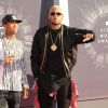 Tyga et Chris Brown arrivent au Forum pour assister aux MTV Video Music Awards 2014. Inglewood, Los Angeles, le 24 août 2014.