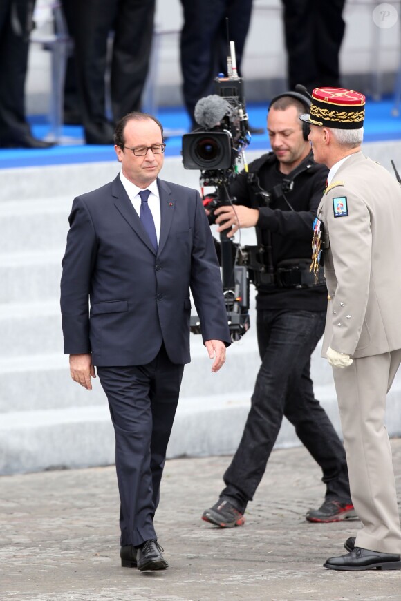 François Hollande lors du défilé militaire du 14 juillet, place de la Concorde à Paris, le 14 juillet 2014.