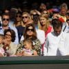 Mirka et ses filles Myla et Charlene lors de la finale du tournoi de Wimbledon à Londres, le 6 juillet 2014