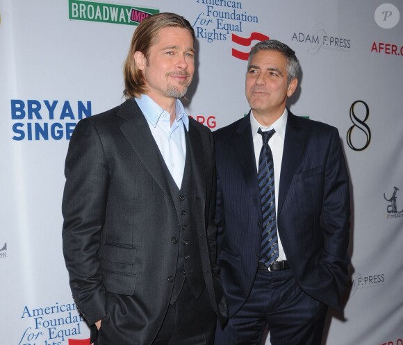 Brad Pitt et George Clooney à Los Angeles, le 3 mars 2012.