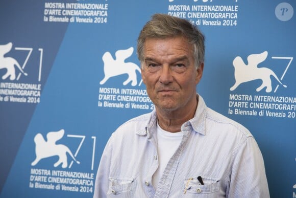 Benoît Jacquot lors du photocall pour le du film "3 Coeurs" au 71e festival international du film de Venise, le 30 août 2014.