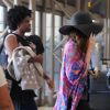 Exclusif - Bodhi avec sa nourrice - Megan Fox et son mari Brian Austin Green prennent un vol à l'aéroport de Los Angeles avec leurs fils Noah et Bodhi, le 24 août 2014.