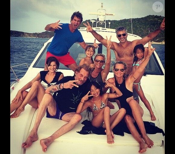 Johnny Hallyday, Laeticia, leurs filles Jade et Joy et leurs amis à Saint-Barthélemy en août 2014