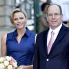 La princesse Charlene de Monaco, enceinte de six mois, et le prince Albert II de Monaco ont participé le 1er septembre 2014 au traditionnel pique-nique des Monégasques, organisé au parc Princesse-Antoinette par la mairie.