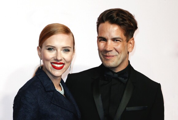 Scarlett Johansson et Romain Dauriac lors de la 39e cérémonie des César au théâtre du Châtelet à Paris, le 28 février 2014.