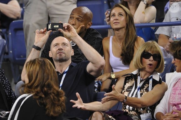 Thierry Henry et sa compagne Andrea Rajacic entourés de Hugh Jackman, son épouse Deborra-Lee Furness et Anna Wintour lors du match entre Roger Federer et Gaël Monfils à l'USTA Billie Jean King National Tennis Center de New York, le 4 septembre 2014