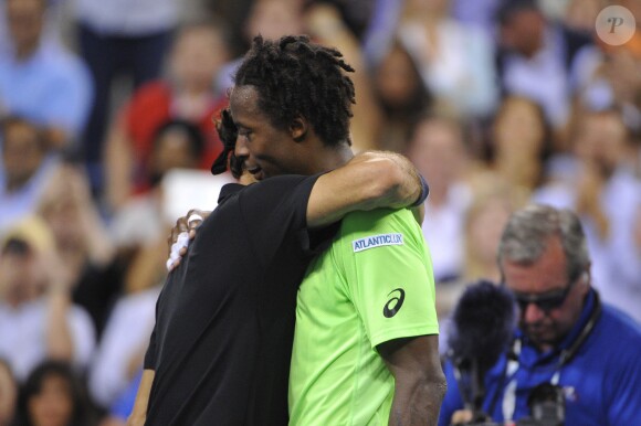 Roger Federer et Gaël Monfils lors de leur quart de finale lors de l'US Open 2014 à New York, le 4 septembre 2014