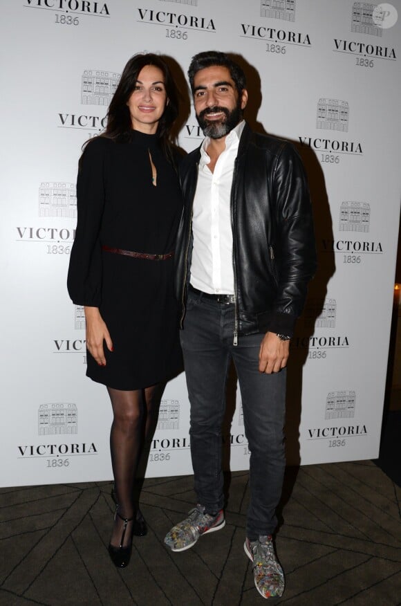 Helena Noguerra et Ary Abittan lors de la soirée d'ouverture du Restaurant Victoria 1836, situé au 12 rue de Presbourg, dans le 16e arrondissement de Paris, le 4 septembre 2014.