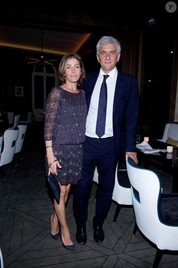 Hervé Morin et sa femme Elodie Garamond lors de la soirée d'ouverture du Restaurant Victoria 1836, situé au 12 rue de Presbourg, dans le 16e arrondissement de Paris, le 4 septembre 2014.