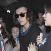 Le chanteur Harry Styles à son arrivée à l'aéroport de Los Angeles, le 5 septembre 2014.