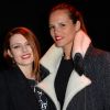 Elodie Frégé et Laure Manaudou lors du défilé de mode "Guy Laroche", collection prêt-à-porter Automne-Hiver 2014/2015, au Grand Palais à Paris le 26 février 2014