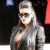 Ayem Nour arrive au Salon de la chambre de commerce et d'industrie pour assister au défilé haute couture Versace automne-hiver 2014-2015. Paris, le 6 juillet 2014.