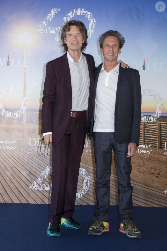 Mick Jagger et Brian Grazer - Photocall du film "Get On Up" lors du 40ème festival du cinéma américain de Deauville, le 12 septembre 2014.