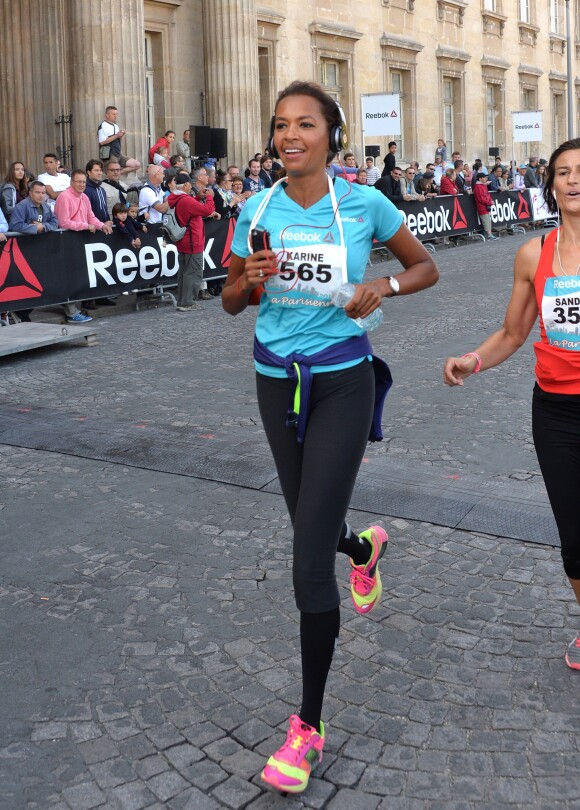 Karine Le Marchand durant la course La Parisienne 2014 pour la lutte contre le cancer, au Champs de Mars à Paris, le 14 septembre 2014