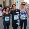 Nathalie Péchalat, Fauve Hautot et Sandrine Retailleau durant la course La Parisienne 2014 pour la lutte contre le cancer, au Champs de Mars à Paris, le 14 septembre 2014