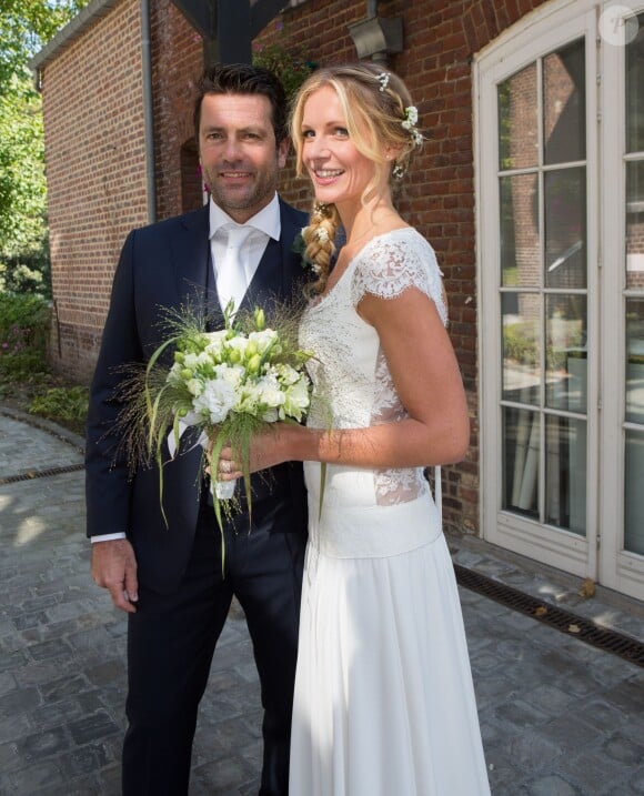 Mariage civil de l'animatrice Sandrine Corman et Michel Bouhoulle (professeur de tennis et consultant sur la RTBF, chaîne de télévision belge) à la mairie de Lasne, près de Bruxelles en Belgique, le 12 septembre 2014.