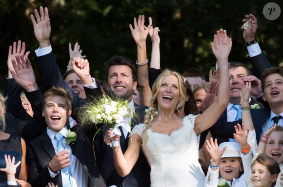 Mariage civil de l'animatrice Sandrine Corman et Michel Bouhoulle (professeur de tennis et consultant sur la RTBF, chaîne de télévision belge) à la mairie de Lasne, près de Bruxelles en Belgique, le 12 septembre 2014.