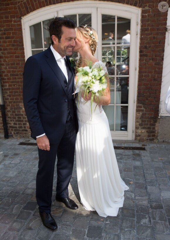 Mariage civil de l'animatrice Sandrine Corman et Michel Bouhoulle (professeur de tennis et consultant sur la RTBF, chaîne de télévision belge) à la mairie de Lasne, près de Bruxelles en Belgique, le 12 septembre 2014.