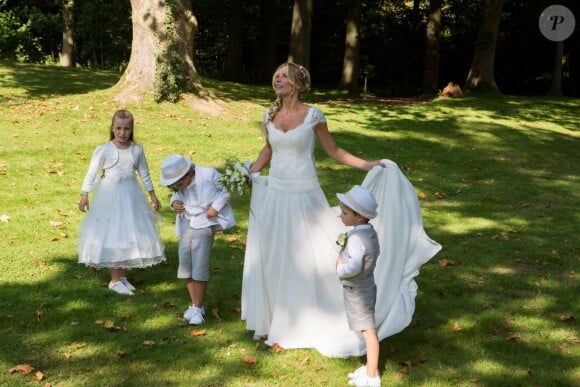 Mariage civil de l'animatrice Sandrine Corman et Michel Bouhoulle (professeur de tennis et consultant sur la RTBF, chaîne de télévision belge) à la mairie de Lasne, près de Bruxelles en Belgique, le 12 septembre 2014.