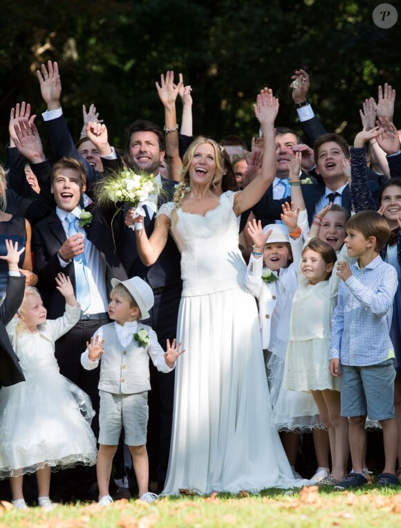 Mariage civil de l'animatrice Sandrine Corman et Michel Bouhoulle (professeur de tennis et consultant sur la RTBF, chaîne de télévision belge) à la mairie de Lasne, près de Bruxelles en Belgique, le 12 septembre 2014.