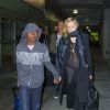 Madonna avec son fils David Banda à leur arrivée à l'aéroport JFK de New York le 27 août 2014