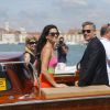 Sandra Bullock et George Clooney arrivent en bateau au 70e festival du film de Venise le 28 août 2013