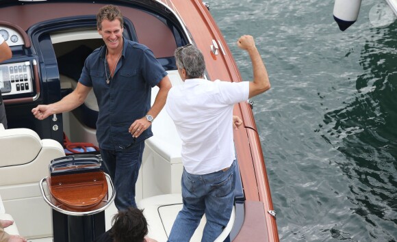 Exclusif - George Clooney et son ami Rande Gerber (mari de Cindy Crawford) invités chez Bono sur la Côte d'Azur le 19 août 2013