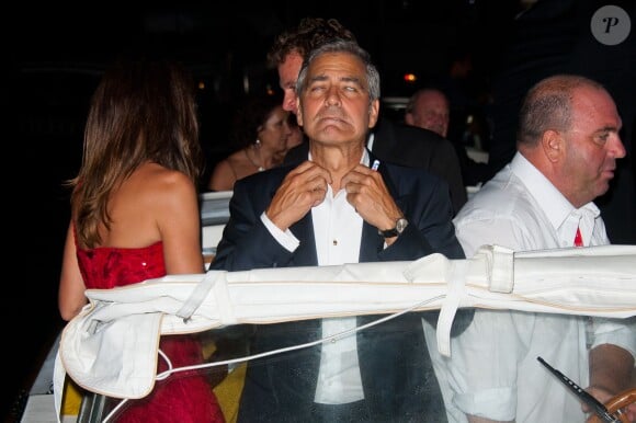 George Clooney, Cindy Crawford et son mari Rande Gerber lors de la Mostra de Venise le 31 août 2011