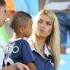 Elodie Mavuba et son fils Tiago lors du match France - Allemagne à Rio de Janeiro au Brésil le 4 juillet 2014