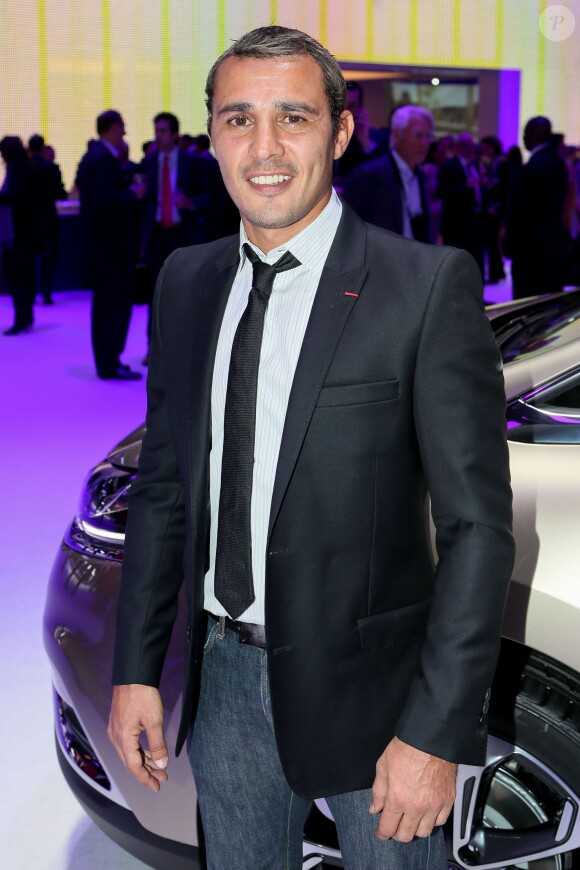 Brahim Asloum lors de la soirée d'inauguration des nouvelles Renault Espace et Clio lors du salon de l'automobile au Parc des Expositions de la porte de Versailles à Paris, le 2 octobre 2014.