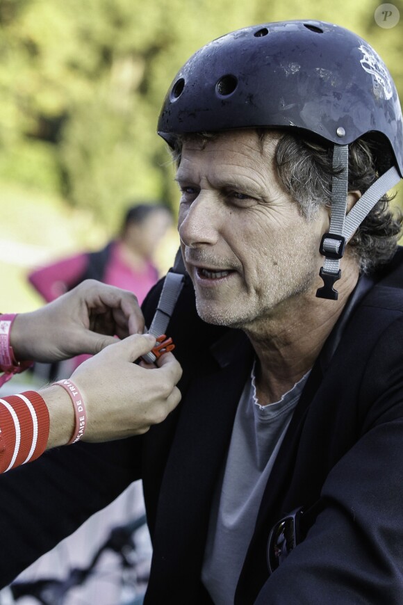 Charles Berling lors du Triathlon des Roses dans le Domaine National de Saint-Cloud le 4 octobre 2014