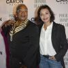 Firmine Richard et Saïda Jawad lors de la soirée des 80 ans du parfum Pour Un Homme de Caron, au Théâtre du Renard, à Paris, le 9 octobre 2014.