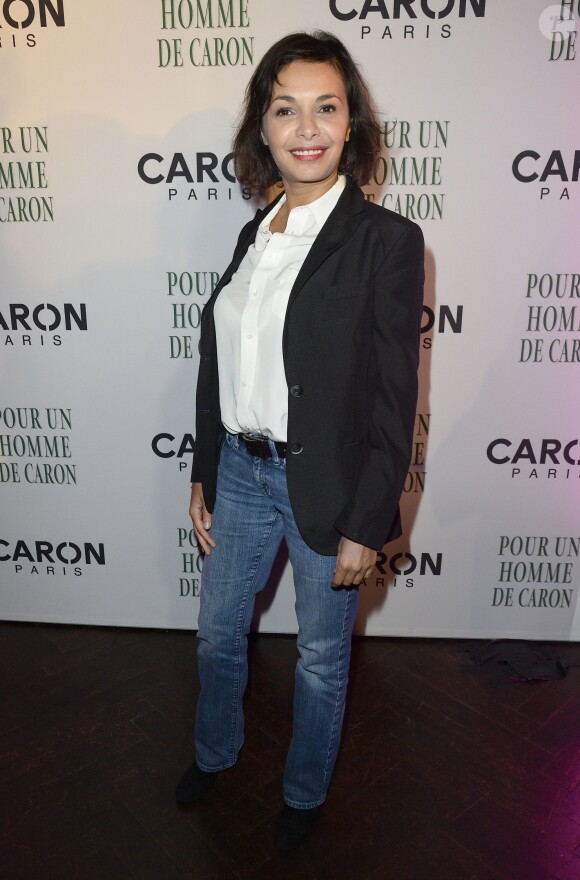 Saïda Jawad pose lors de la soirée des 80 ans du parfum Pour Un Homme de Caron, au Théâtre du Renard, à Paris, le 9 octobre 2014.
